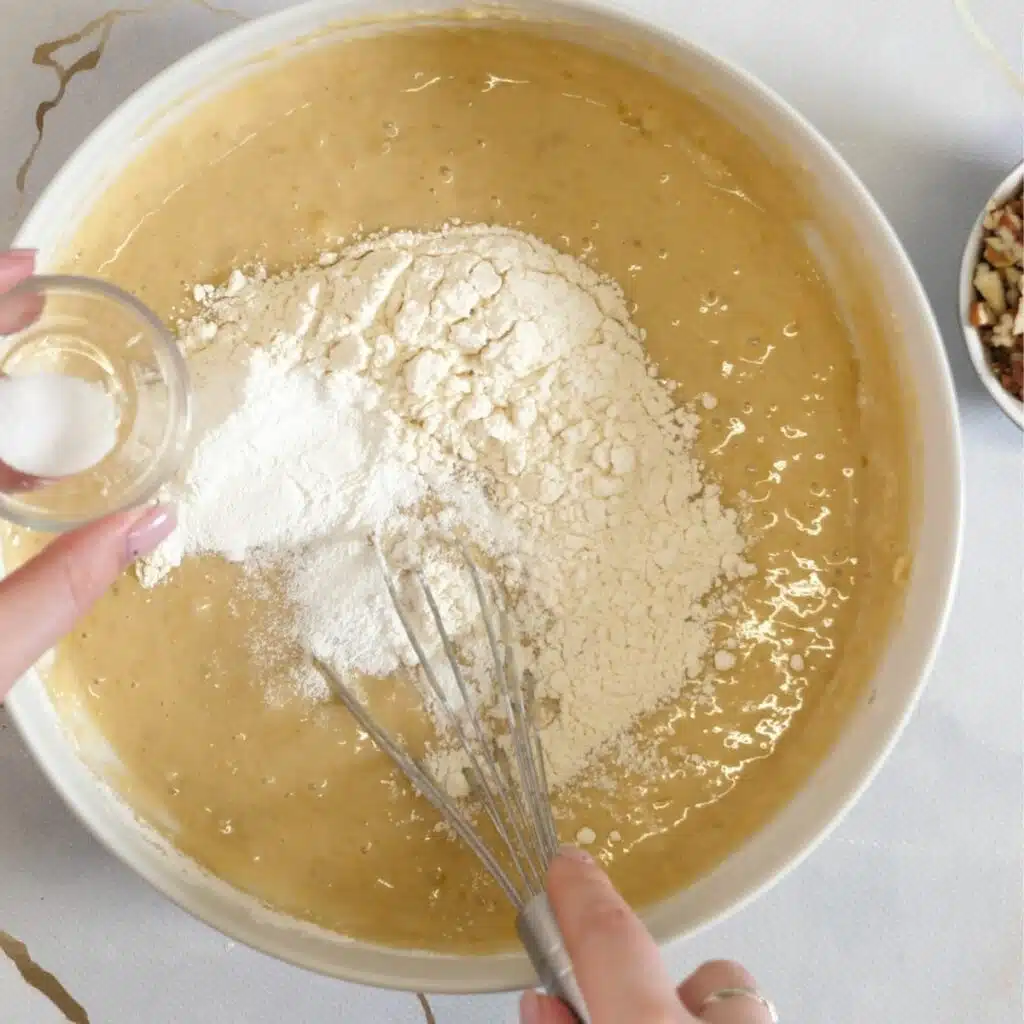 how to make banana nut muffins  add the dry ingredients