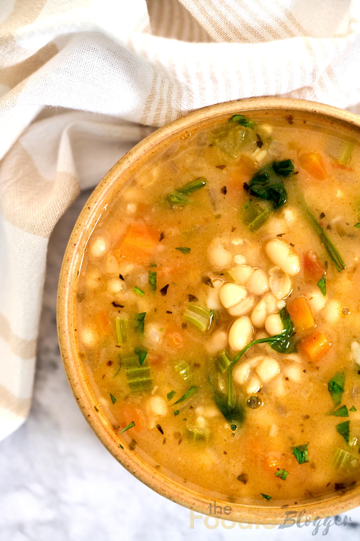the best Mediterranean White Bean Soup TheFoodieBlogger