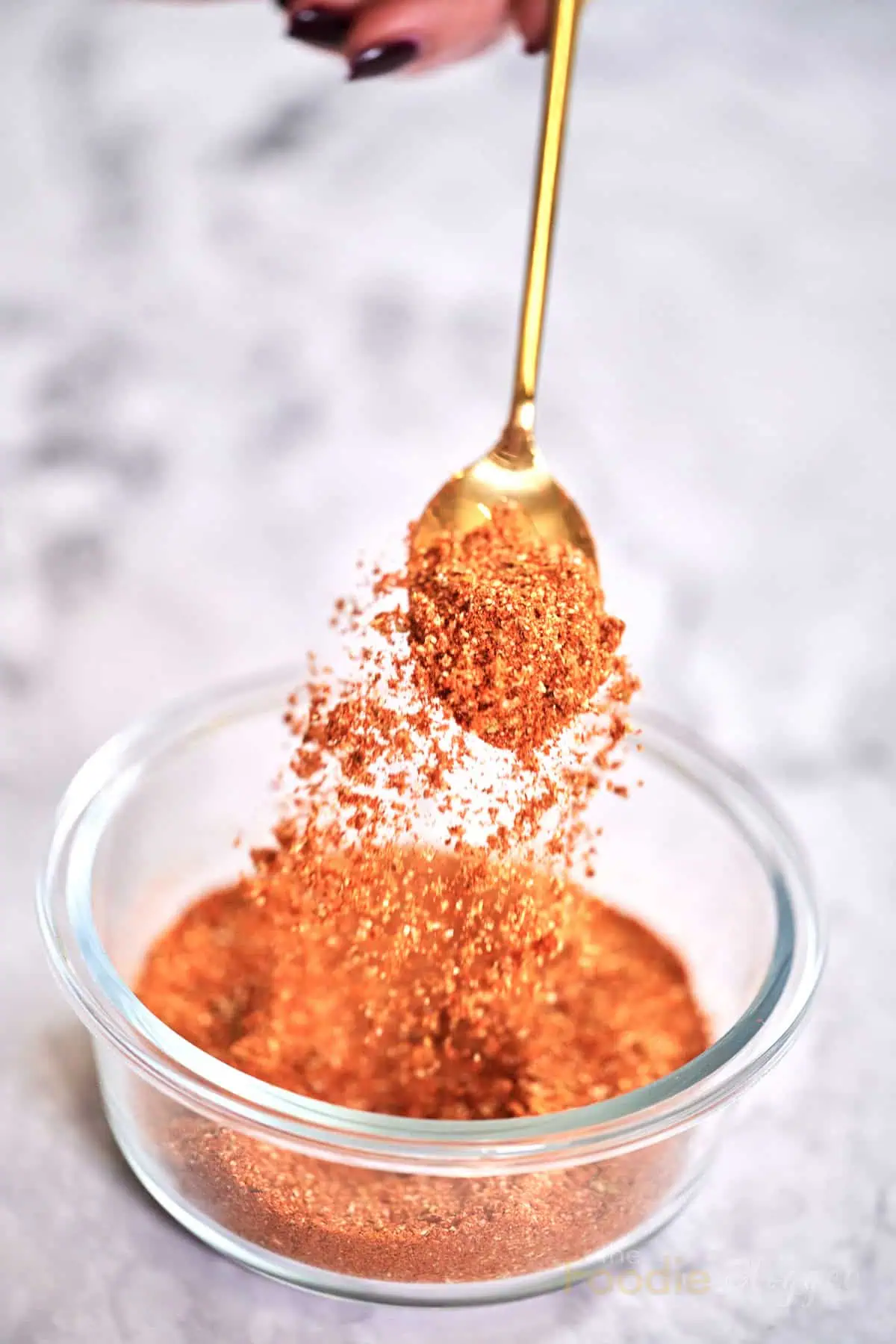 thefoodieblogger homemade taco seasoning blend in a spoon