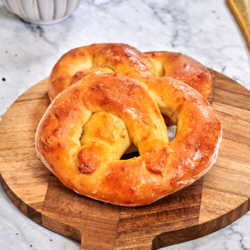 2-Ingredient Pretzels 4 2 Ingredient Dough Pretzels on a wooden board