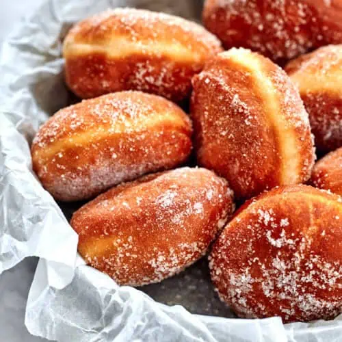 Brioche Donuts 15 sugar-dusted brioche donuts, ready to serve for breakfast or brunch.