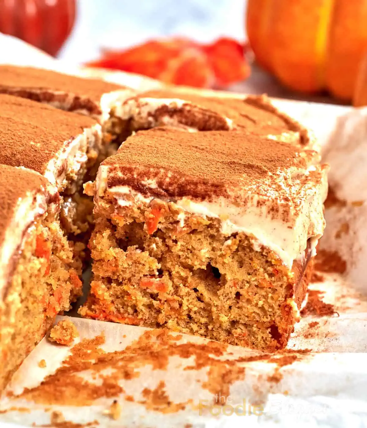 Carrot Cake Bars 12 Macro shot of carrot cake bar corners, highlighting the contrast between the spiced cake and its silky, cinnamon-topped icing.