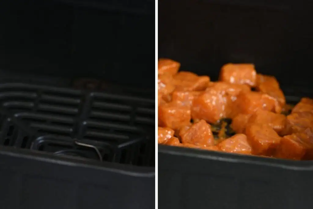 Bang Bang Salmon 5 Marinated salmon cubes arranged in an air fryer basket ready to cook.