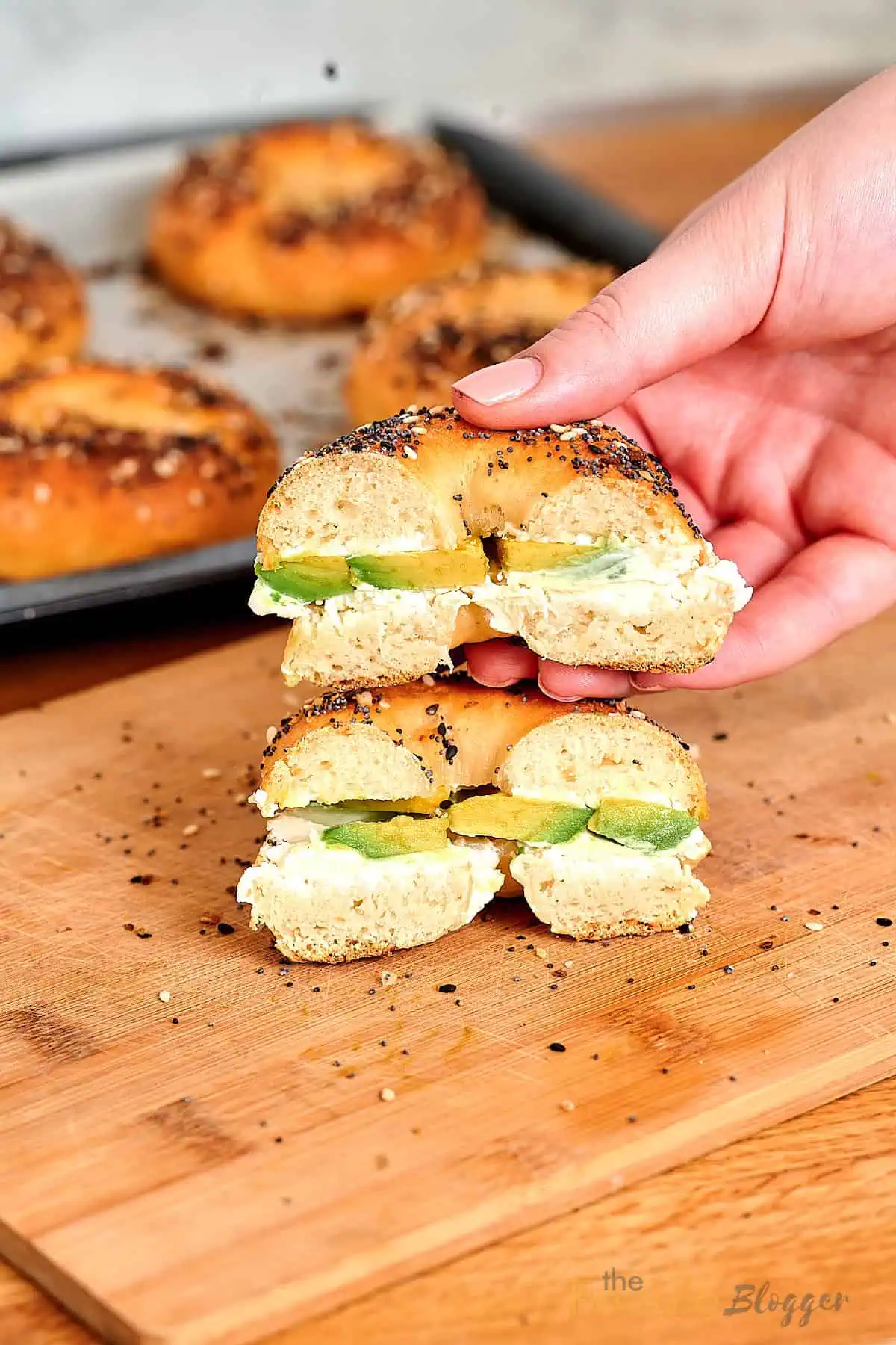 Cottage Cheese Bagels 4 Fluffy cottage cheese bagel cut in half and filled with avocado and creamy cheese spread.