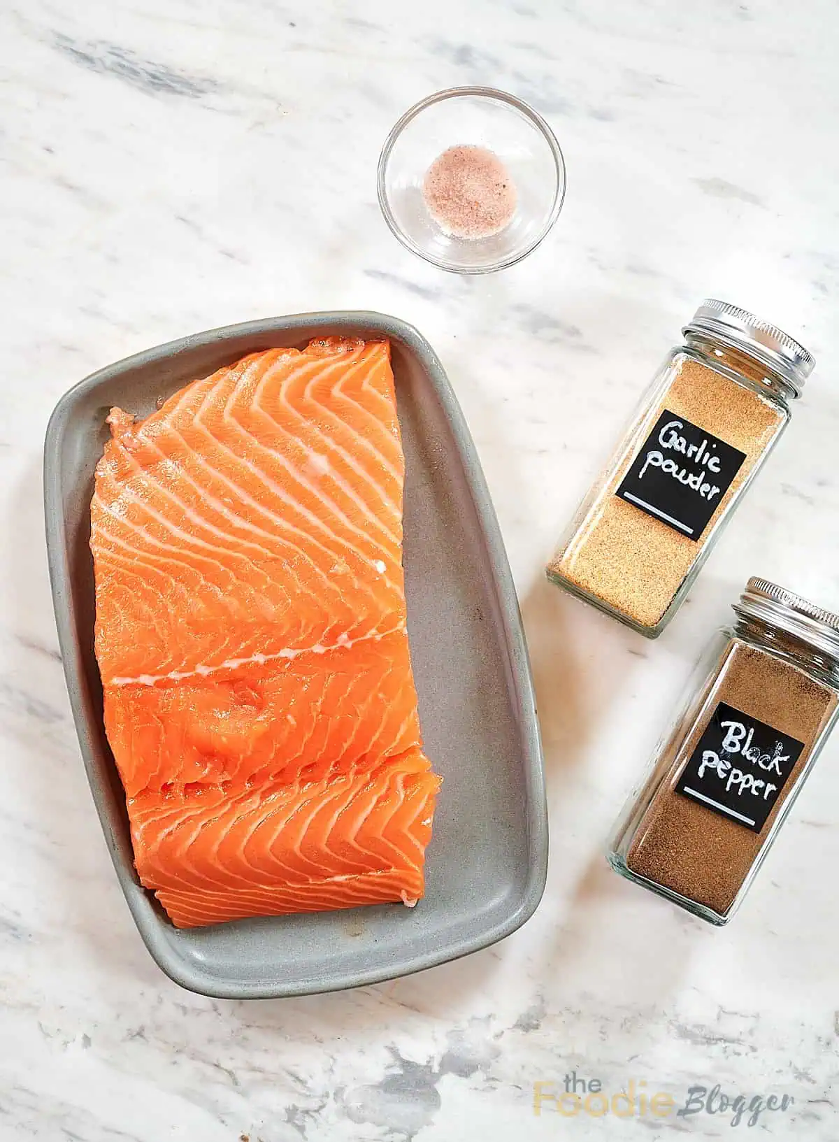 Salmon Sushi Bake 3 Ingredients for salmon sushi bake including raw salmon and simple seasonings.