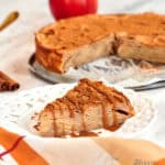 Single serving of apple layer cake showing tender apple slices inside.
