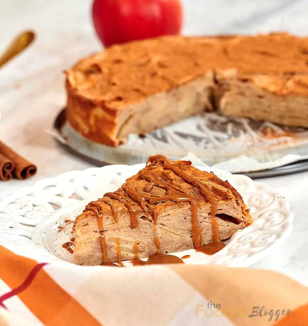The Foodie Blogger - Tried, True, and Delicious Recipes 13 Single serving of apple layer cake showing tender apple slices inside.