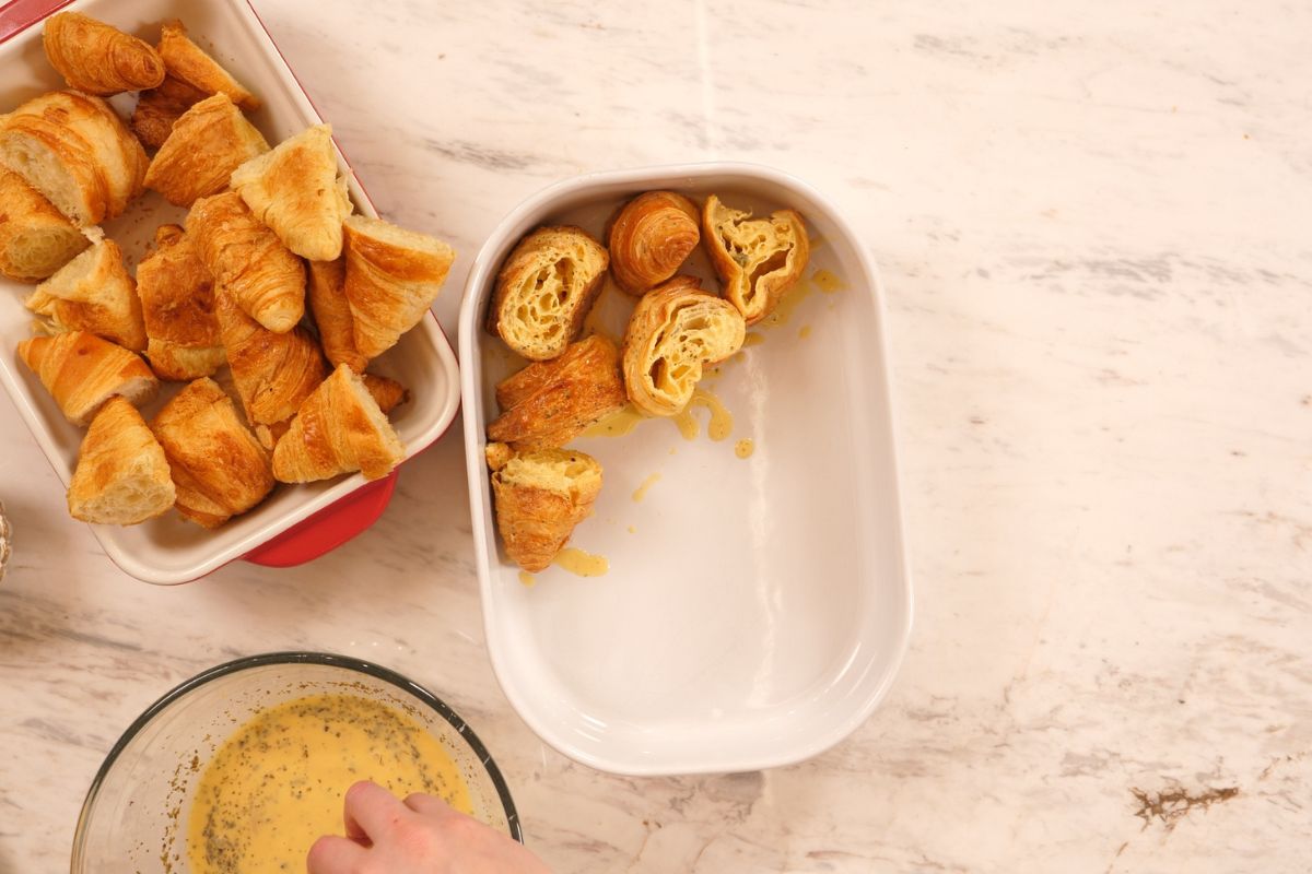 Ham and Cheese Croissant Breakfast Bake 7 Croissant pieces arranged in baking dish