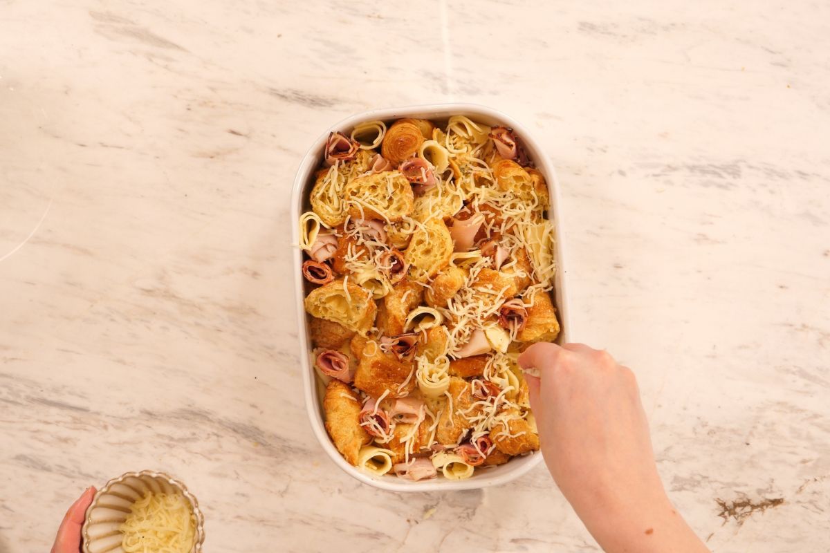 Ham and Cheese Croissant Breakfast Bake 9 Topping croissant breakfast bake with shredded cheese