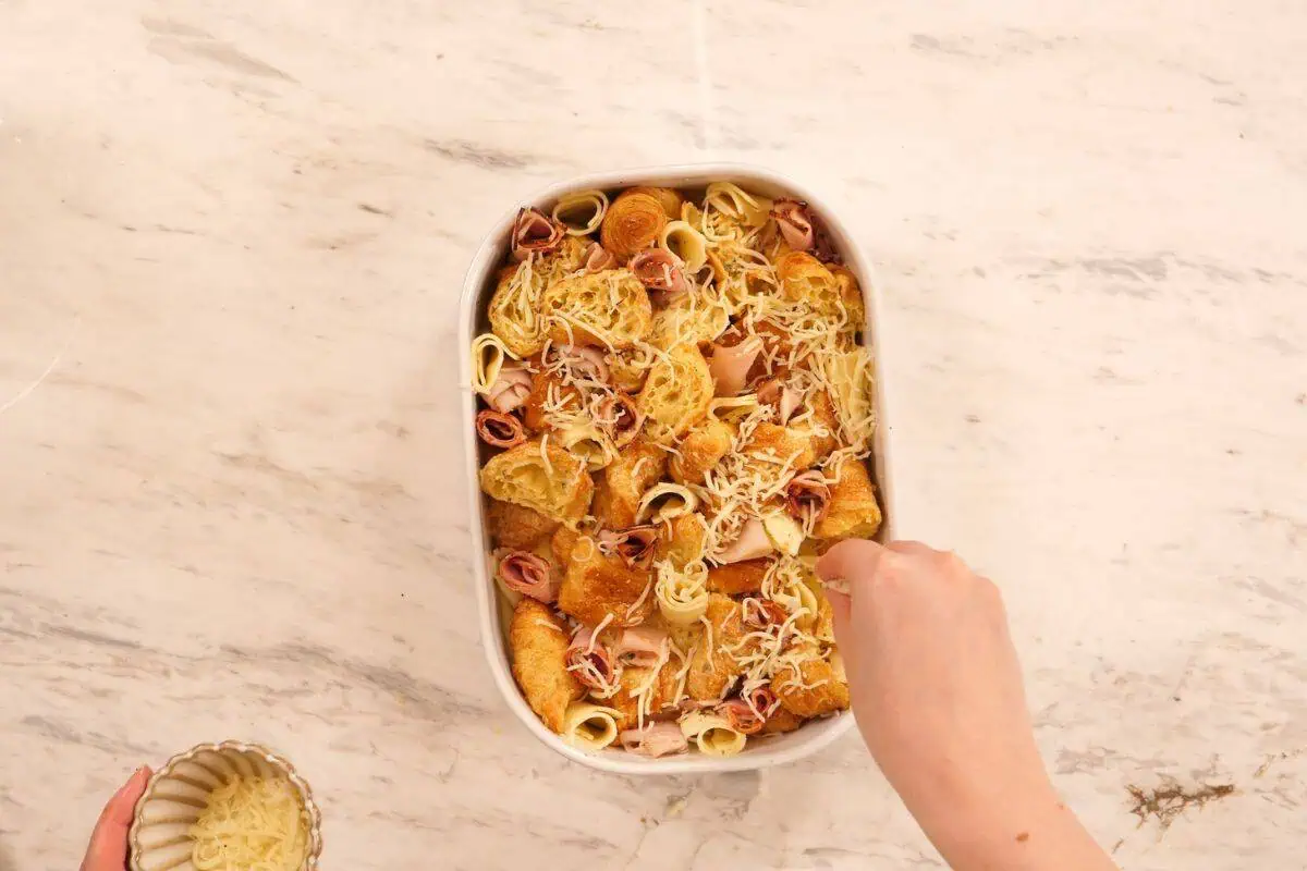 Ham and Cheese Croissant Breakfast Bake 9 Topping croissant breakfast bake with shredded cheese