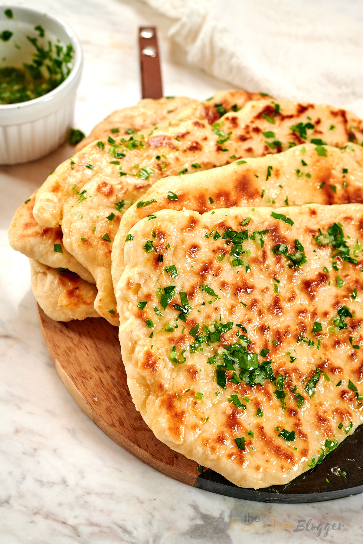 2-Ingredient Garlic Butter Naan 12 Freshly cooked 2-ingredient garlic butter naan served with garlic herb butter dipping sauce.