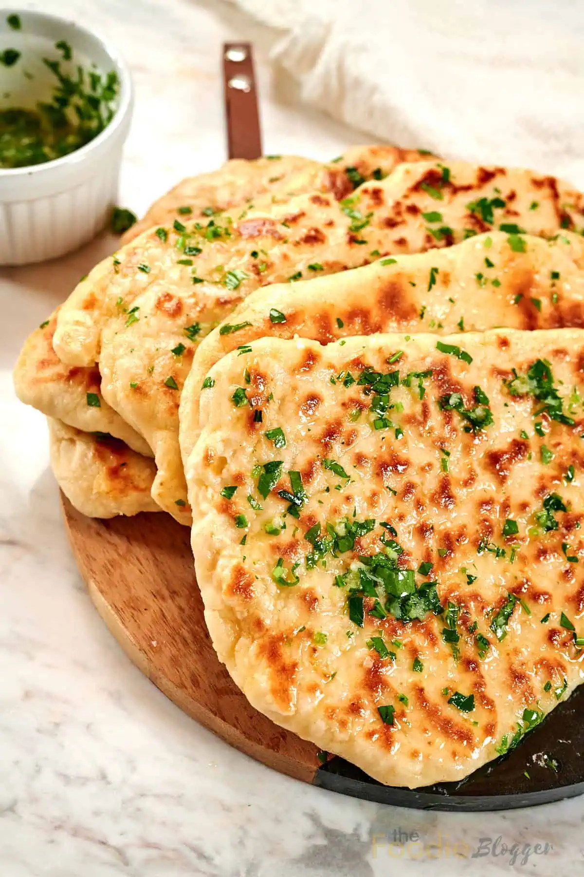 2-Ingredient Garlic Butter Naan 12 Freshly cooked 2-ingredient garlic butter naan served with garlic herb butter dipping sauce.