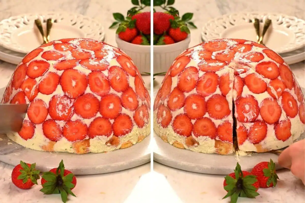 No-Bake Strawberry Lime Charlotte Cake 12 Chilled strawberry-covered Charlotte cake being sliced to reveal the creamy layered filling inside.